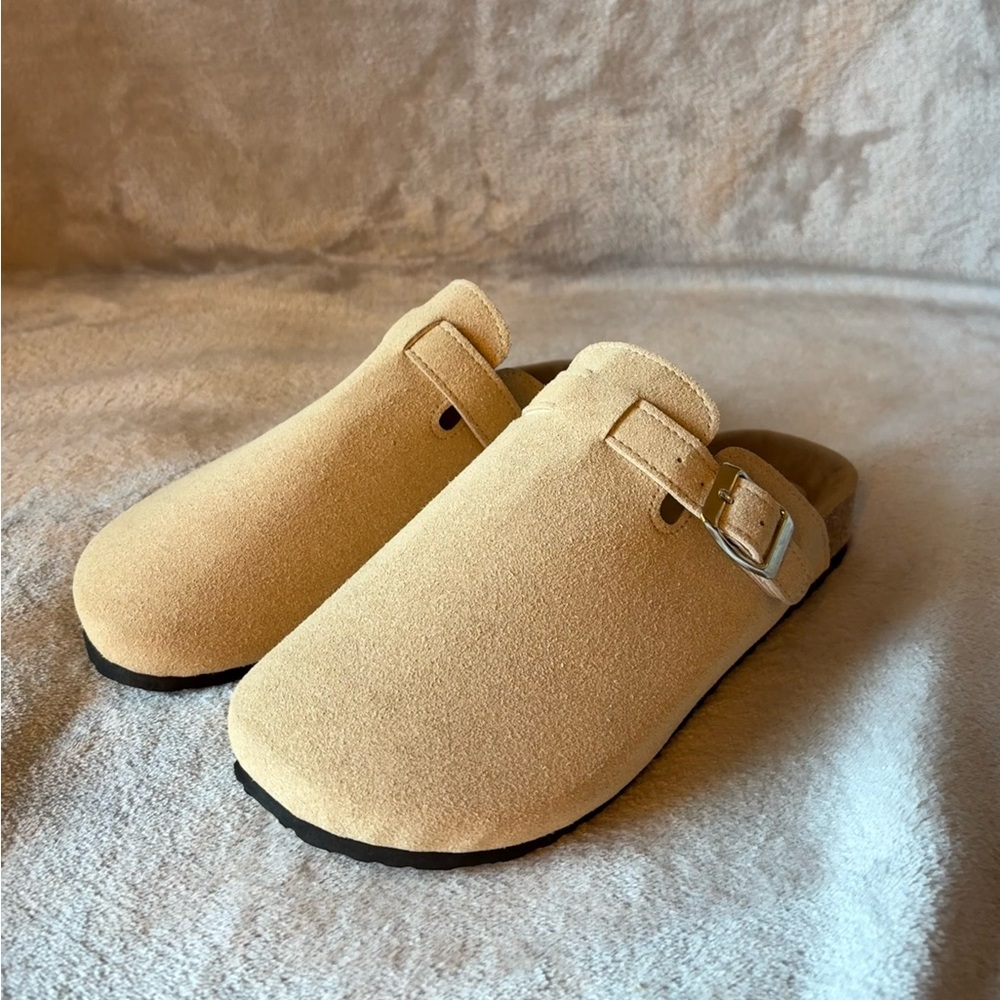 Brand new size 8.5 / EU 39 Tan Faux suede clogs with adjustable belt buckle.